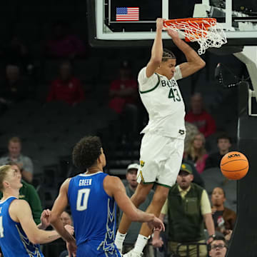 Nov 24, 2025; Las Vegas, Nevada, USA; Baylor Bears guard Cameron Carr (43) follows through on the dunk against the Creighton Bluejays during the second half in a 2025 Players Era Festival group play game at Michelob Ultra Arena. Mandatory Credit: Kirby Lee-Imagn Images