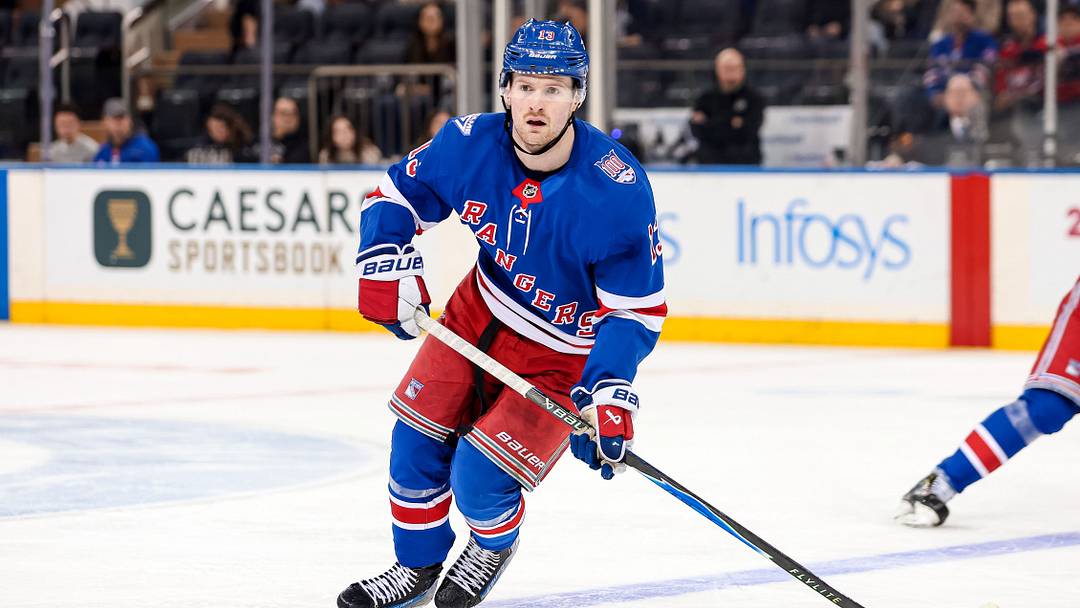 Apr 5, 2026; New York, New York, USA; New York Rangers left wing Alexis Lafreniere (13) skates against the Washington Capitals during the second period at Madison Square Garden. Mandatory Credit: Danny Wild-Imagn Images