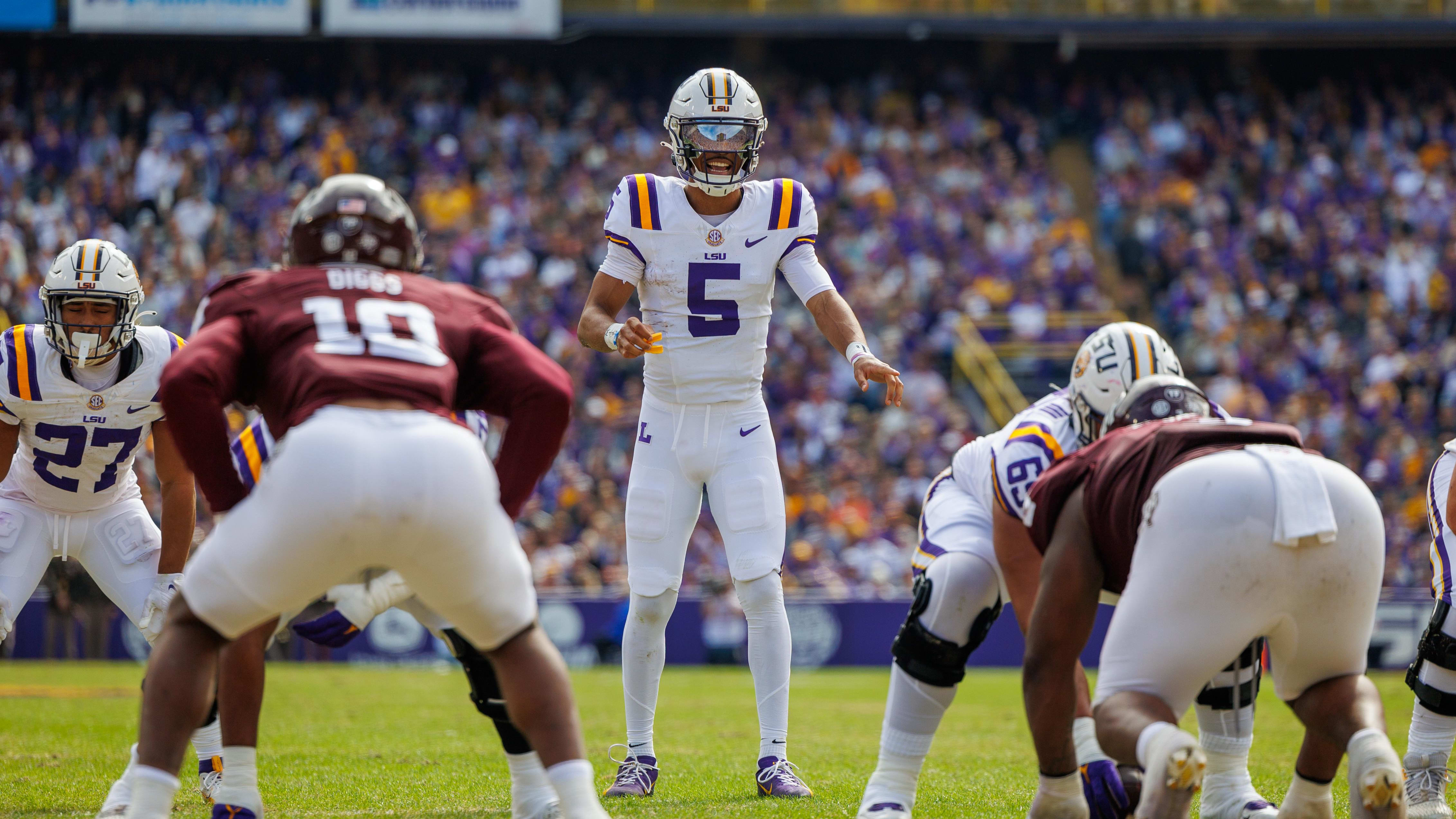 Nov 25, 2023; Baton Rouge, Louisiana, USA;  LSU Tigers quarterback Jayden Daniels (5) calls a play.