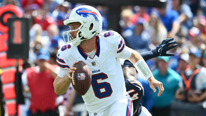 Aug 10, 2024; Orchard Park, New York, USA; Buffalo Bills quarterback Shane Buechele (6) rolls out of the pocket in the third quarter of a pre-season game against the Chicago Bears at Highmark Stadium. Mandatory Credit: Mark Konezny-USA TODAY Sports