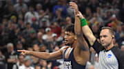 Penn State's Carter Starocci celebrate his win over Parker Keckeisen of Northern Iowa at te 2025 NCAA Wrestling Championships. 