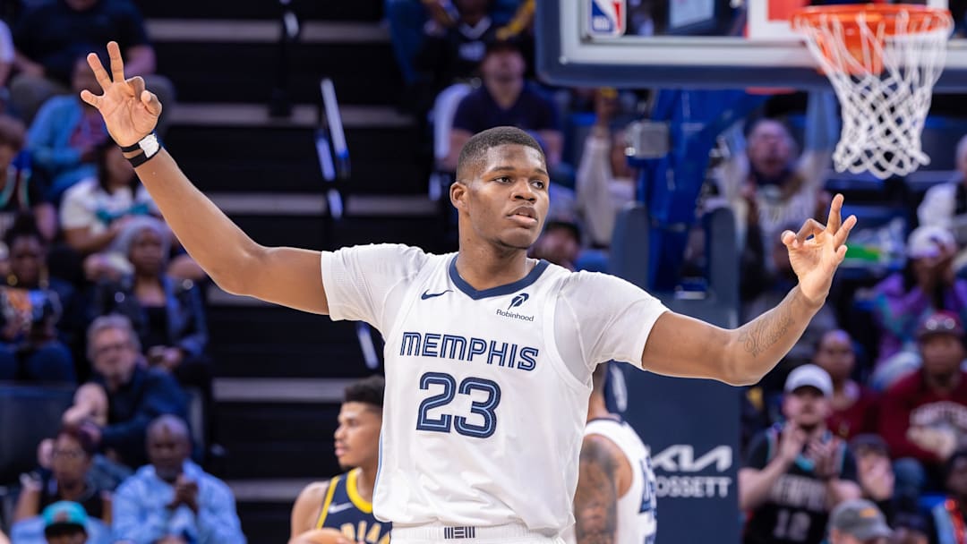 Oct 25, 2025; Memphis, Tennessee, USA; Memphis Grizzlies forward Cedric Coward (23) reacts after a three point basket against the Indiana Pacers during the second half at FedExForum. Mandatory Credit: Wesley Hale-Imagn Images