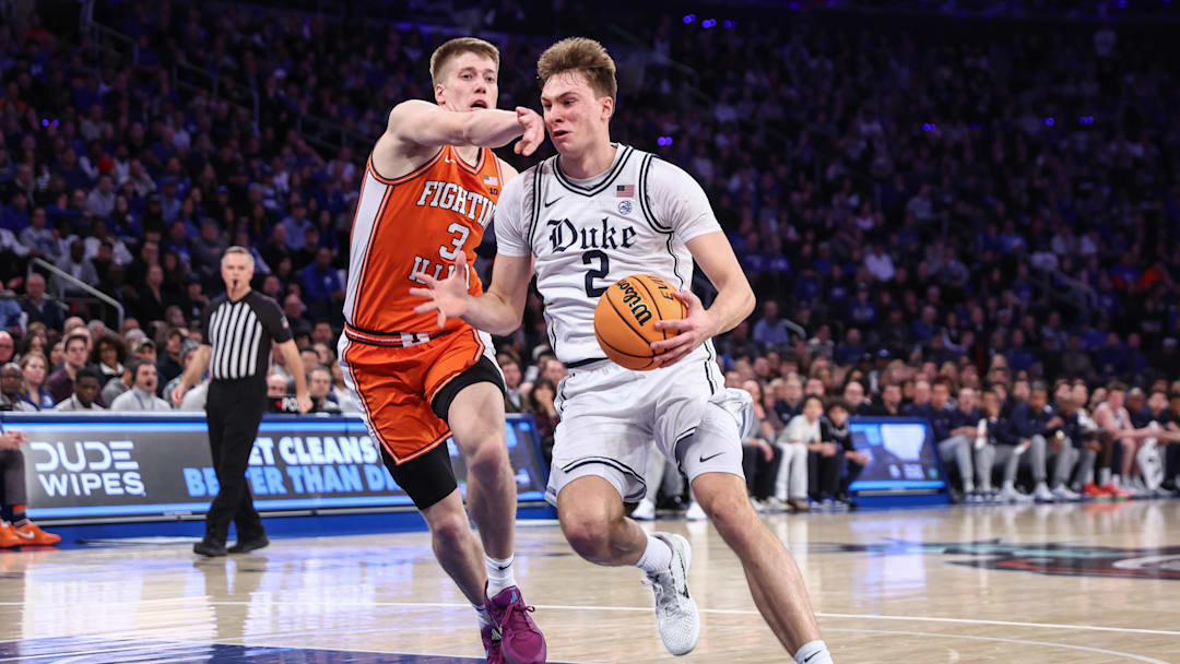 Feb 22, 2025; New York, NY, USA;  Duke Blue Devils guard Cooper Flagg (2) drives past Illinois Fighting Illini forward Ben Humrichous (3) in the first half at Madison Square Garden. Mandatory Credit: Wendell Cruz-Imagn Images