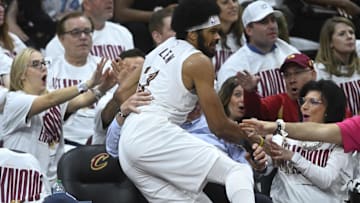 Apr 20, 2025; Cleveland, Ohio, USA; Cleveland Cavaliers center Jarrett Allen (31) falls in to the first row of seats in the third quarter against the Miami Heat at Rocket Arena. Mandatory Credit: David Richard-Imagn Images