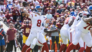 Sep 15, 2024; Landover, Maryland, USA; New York Giants quarterback Daniel Jones (8) drops back to pass in the first half the Washington Commanders at Commanders Field. Mandatory Credit: Luke Johnson-Imagn Images