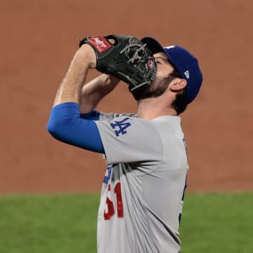 Sep 18, 2020; Denver, Colorado, USA; Los Angeles Dodgers relief pitcher Dylan Floro (51) reacts on the mound in the sixth inning against the Colorado Rockies at Coors Field. Mandatory Credit: Isaiah J. Downing-USA TODAY Sports