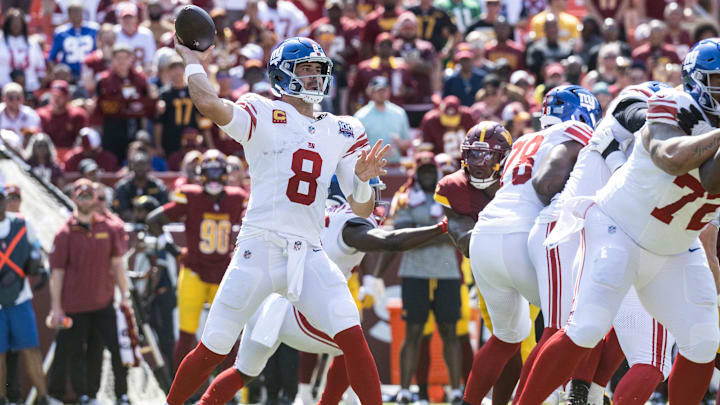 Sep 15, 2024; Landover, Maryland, USA; New York Giants quarterback Daniel Jones (8) drops back to pass the Washington Commanders at Commanders Field in the first half.  