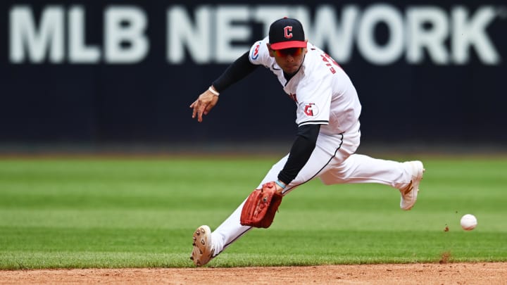 Aug 7, 2024; Cleveland, Ohio, USA; Cleveland Guardians second baseman Andres Gimenez (0) fields a ball hit by Arizona Diamondbacks first baseman Josh Bell (not pictured) during the third inning at Progressive Field. Mandatory Credit: Ken Blaze-USA TODAY Sports