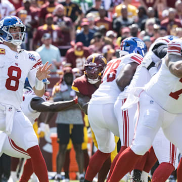 Sep 15, 2024; Landover, Maryland, USA; New York Giants quarterback Daniel Jones (8) drops back to pass in the first half the Washington Commanders at Commanders Field.  