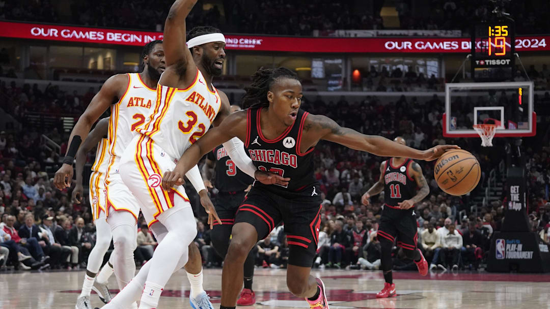 Apr 17, 2024; Chicago, Illinois, USA; Atlanta Hawks guard Wesley Matthews (32) defends Chicago Bulls guard Ayo Dosunmu (12) during the first quarter during a play-in game of the 2024 NBA playoffs at United Center. Mandatory Credit: David Banks-Imagn Images Apr 17, 2024; Chicago, Illinois, USA; Atlanta Hawks guard Wesley Matthews (32) defends Chicago Bulls guard Ayo Dosunmu (12) during the first quarter during a play-in game of the 2024 NBA playoffs at United Center. Mandatory Credit: David Banks-Imagn Images