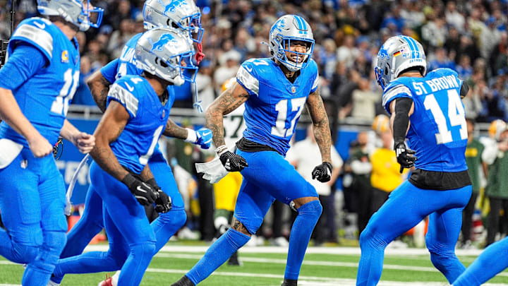 Detroit Lions wide receiver Tim Patrick celebrates a touchdown with his teammates.