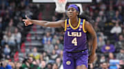Mar 30, 2025; Spokane, WA, USA; LSU Lady Tigers guard Flau'Jae Johnson (4) reacts after play against the UCLA Bruins during the first half of a Elite 8 NCAA Tournament basketball game at Spokane Arena. Mandatory Credit: James Snook-Imagn Images