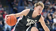 Jan 11, 2025; Spokane, Washington, USA; Washington State Cougars guard Parker Gerrits (10) controls the ball against the Gonzaga Bulldogs in the first half at McCarthey Athletic Center. Mandatory Credit: James Snook-Imagn Images