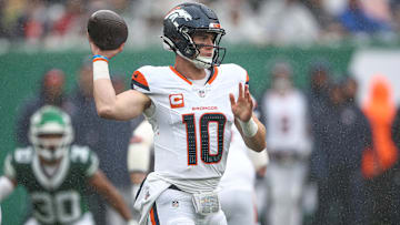 Sep 29, 2024; East Rutherford, New Jersey, USA; Denver Broncos quarterback Bo Nix (10) throws the ball during the first half against the New York Jets at MetLife Stadium. 