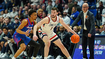 Jan 29, 2025; Hartford, Connecticut, USA; UConn Huskies forward Alex Karaban (11) moves the ball against DePaul Blue Demons guard CJ Gunn (11) in the second half at XL Center. Mandatory Credit: David Butler II-Imagn Images