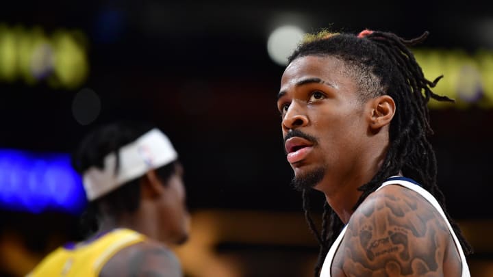 Apr 24, 2023; Los Angeles, California, USA; Memphis Grizzlies guard Ja Morant (12) reacts during the first half in game four of the 2023 NBA playoffs at Crypto.com Arena. Mandatory Credit: Gary A. Vasquez-USA TODAY Sports