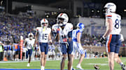 Nov 15, 2025; Durham, North Carolina, USA;  Virginia Cavaliers wide receiver Trell Harris (11) celebrates a touchdown against the Duke Blue Devils in the third quarter at Wallace Wade Stadium. Mandatory Credit: Zachary Taft-Imagn Images