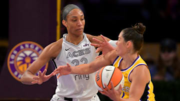 Sep 11, 2025; Los Angeles, California, USA; Las Vegas Aces center A'ja Wilson (22) guards Los Angeles Sparks guard Kelsey Plum (10) in the first half at Crypto.com Arena. Mandatory Credit: Jayne Kamin-Oncea-Imagn Images
