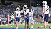 Nov 15, 2025; Durham, North Carolina, USA;  Virginia Cavaliers wide receiver Trell Harris (11) celebrates a touchdown against the Duke Blue Devils in the third quarter at Wallace Wade Stadium. Mandatory Credit: Zachary Taft-Imagn Images