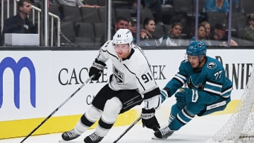 Sep 25, 2022; San Jose, California, USA; Los Angeles Kings forward Carl Grundstrom (91) controls the