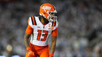 Sep 28, 2024; University Park, Pennsylvania, USA; Illinois Fighting Illini wide receiver Pat Bryant (13) lines up during the second quarter against the Penn State Nittany Lions at Beaver Stadium. Mandatory Credit: Matthew O'Haren-Imagn Images