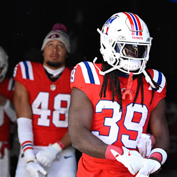 Dec 1, 2024; Foxborough, Massachusetts, USA; New England Patriots running back JaMycal Hasty (39) walks out of the player's tunnel before a game against the Indianapolis Colts at Gillette Stadium. Mandatory Credit: Eric Canha-Imagn Images