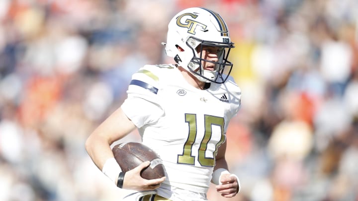 Nov 4, 2023; Charlottesville, Virginia, USA; Georgia Tech Yellow Jackets quarterback Haynes King (10) scores a touchdown against the Virginia Cavaliers during the first half at Scott Stadium. Mandatory Credit: Amber Searls-USA TODAY Sports