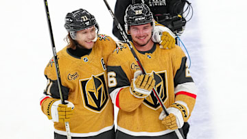 Apr 12, 2025; Las Vegas, Nevada, USA; Vegas Golden Knights center William Karlsson (71) celebrates with Vegas Golden Knights right wing Alexander Holtz (26) after the Golden Knights defeated the Nashville Predators 4-3 at T-Mobile Arena. Mandatory Credit: Stephen R. Sylvanie-Imagn Images
