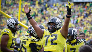 Oregon offensive lineman Iapani Laloulu celebrates a touchdown by Oregon running back Noah Whittington as the No. 1 Oregon Ducks host the No. 21 Illinois Fighting Illini Saturday, Oct. 26, 2024 at Autzen Stadium in Eugene, Ore.
