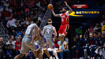 Apr 4, 2023; New Orleans, Louisiana, USA;  New Orleans Pelicans forward Brandon Ingram (14) passes the ball against Sacramento Kings guard Kevin Huerter (9) during the first half at Smoothie King Center. Mandatory Credit: Stephen Lew-USA TODAY Sports