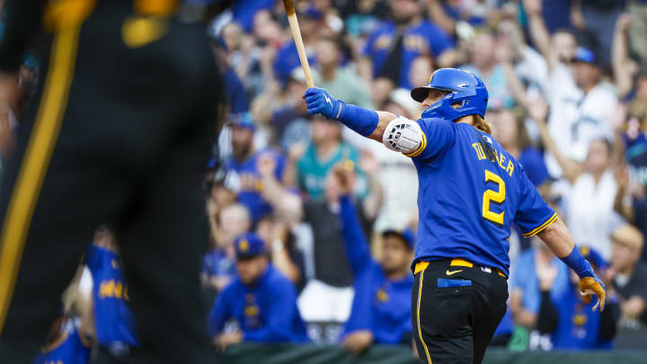 Seattle Mariners designated hitter Justin Turner watches his grand slam home run against the Philadelphia Phillies on Friday.