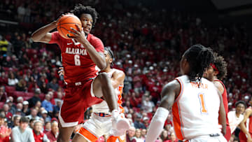 Alabama forward London Jemison rebounds the ball against Clemson at the ACC/SEC Challenge. The Tide won, 90–84.