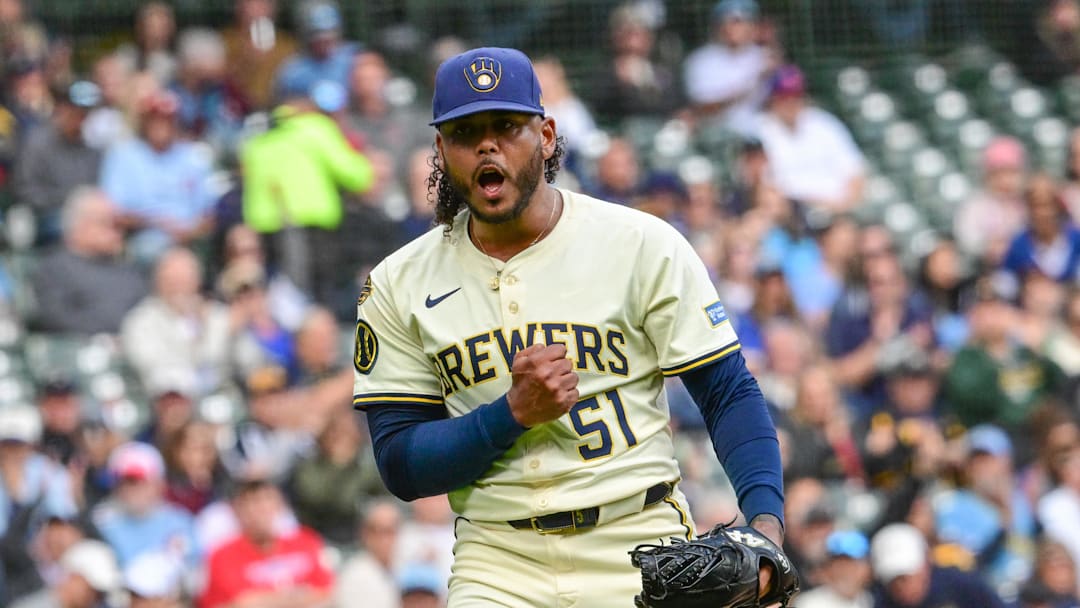 Sep 4, 2025; Milwaukee, Wisconsin, USA; Milwaukee Brewers starting pitcher Freddy Peralta (51) reacts after striking out Philadelphia Phillies third baseman Alec Bohm (not pictured) with the bases loaded in the fourth inning at American Family Field. Mandatory Credit: Benny Sieu-Imagn Images Sep 4, 2025; Milwaukee, Wisconsin, USA; Milwaukee Brewers starting pitcher Freddy Peralta (51) reacts after striking out Philadelphia Phillies third baseman Alec Bohm (not pictured) with the bases loaded in the fourth inning at American Family Field. Mandatory Credit: Benny Sieu-Imagn Images