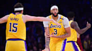 Dec 31, 2024; Los Angeles, California, USA; Los Angeles Lakers forward Anthony Davis (3) reacts after scoring a three point basket against the Cleveland Cavaliers during the second half at Crypto.com Arena. Mandatory Credit: Gary A. Vasquez-Imagn Images