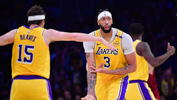 Dec 31, 2024; Los Angeles, California, USA; Los Angeles Lakers forward Anthony Davis (3) reacts after scoring a three point basket against the Cleveland Cavaliers during the second half at Crypto.com Arena. Mandatory Credit: Gary A. Vasquez-Imagn Images