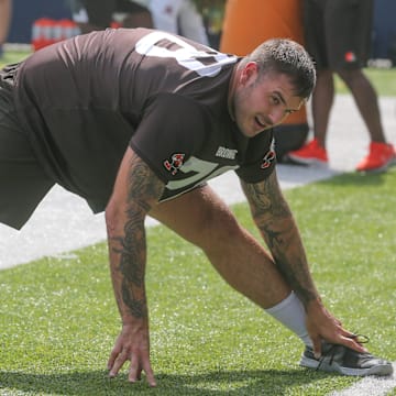 Cleveland Browns offensive lineman Jack Conklin stretches before minicamp on Wednesday, June 15, 2022 in Canton, Ohio, at Tom Benson Hall of Fame Stadium.

Browns Hof 3