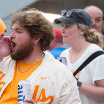 A Tennessee baseball fans yells out to Evansville players during the Knoxville Super Regional in the NCAA baseball tournament on Sunday, June 9, 2024 in Knoxville, Tenn.