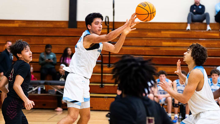 Ponte Vedra Sharks guard David Sanchez Barrera (2) passes the ball in the second half. The St. Augustine Yellow Jackets played the Ponte Vedra Sharks in the District 4-5A Final Friday night, February 7, 2025 at Ed White High School in Jacksonville, Fla. Ponte Vedra defeated St. Augustine 49-30. [Doug Engle/Florida Times-Union]2025