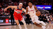 Nov 12, 2025; Houston, Texas, USA; Houston Rockets guard Amen Thompson (1) handles the ball against Washington Wizards forward Corey Kispert (24) during the second quarter at Toyota Center. Mandatory Credit: Erik Williams-Imagn Images