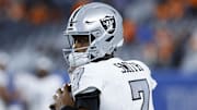 Nov 6, 2025; Denver, Colorado, USA; Las Vegas Raiders quarterback Geno Smith (7) practices before the game at Empower Field at Mile High. Mandatory Credit: Isaiah J. Downing-Imagn Images