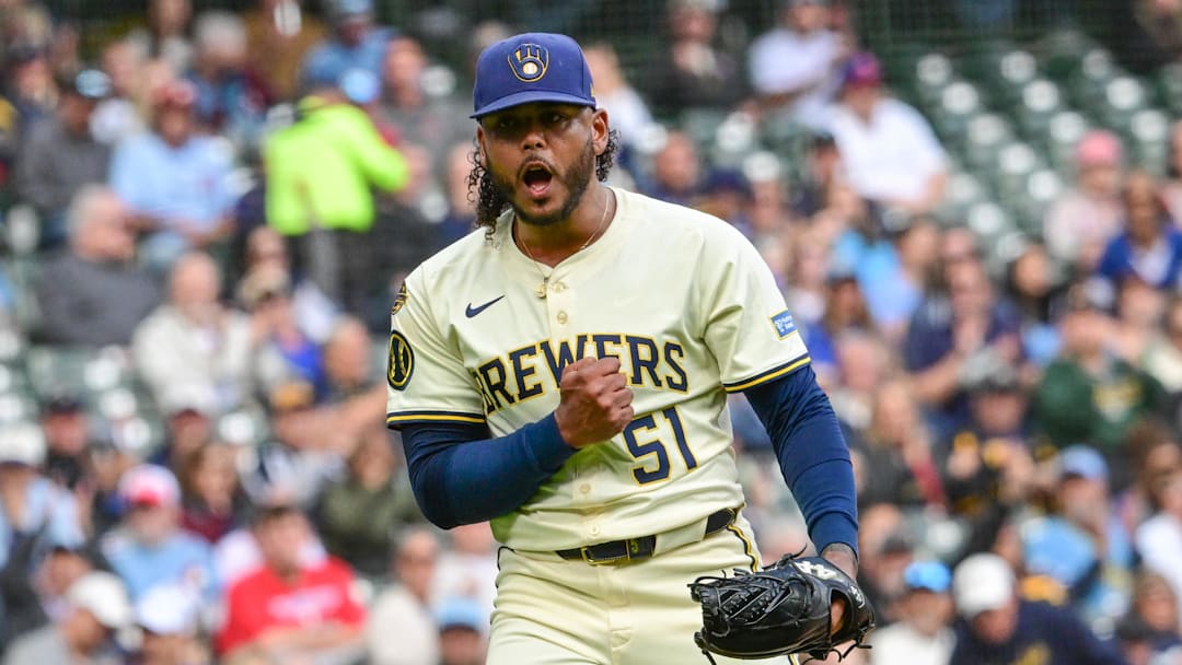Sep 4, 2025; Milwaukee, Wisconsin, USA;  Milwaukee Brewers starting pitcher Freddy Peralta (51) reacts after striking out Philadelphia Phillies third baseman Alec Bohm (not pictured) with the bases loaded in the fourth inning at American Family Field. Mandatory Credit: Benny Sieu-Imagn Images