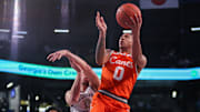 Mar 4, 2025; Atlanta, Georgia, USA; Miami Hurricanes guard Matthew Cleveland (0) shoots against the Georgia Tech Yellow Jackets in the first half at McCamish Pavilion. Mandatory Credit: Brett Davis-Imagn Images