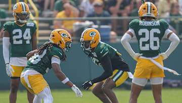 Green Bay cornerbacks Gregory Junior (28) and Bo Melton (16) run through a drill during practice on Thursday, July 31, 2025, at Ray Nitschke Field in Ashwaubenon, Wis. 
Tork Mason/USA TODAY NETWORK-Wisconsin