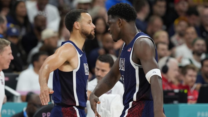 United States guard Anthony Edwards (5) celebrates with guard Stephen Curry (4) after a basket in the fourth quarter against Puerto Rico during the Paris Olympics at Stade Pierre-Mauroy in Villeneuve-d'Ascq, France, on Aug. 3, 2024.