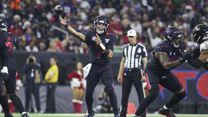  Houston Texans quarterback C.J. Stroud (7) throws the ball during the second quarter against the Baltimore Ravens at NRG Stadium. 