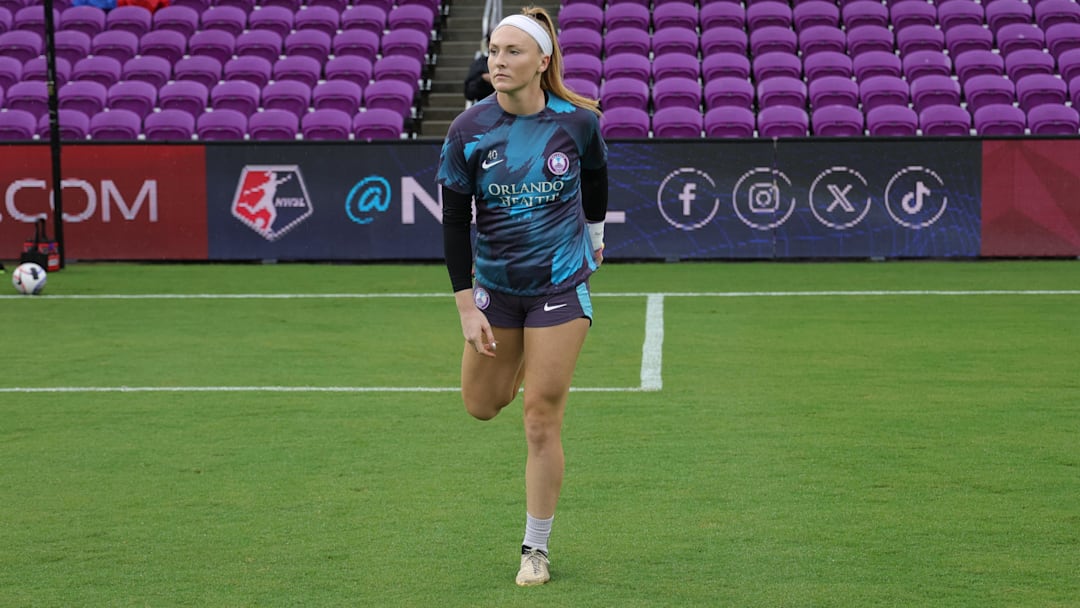 Oct 6, 2024; Orlando, Florida, USA; Orlando Pride defender Mckinley Crone (40) warm up before their match against the Washington Spirit at Inter&Co Stadium. Mandatory Credit: Mike Watters-Imagn Images