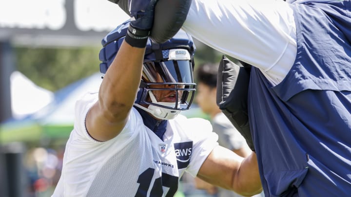 Jul 28, 2023; Renton, WA, USA; Seattle Seahawks linebacker Uchenna Nwosu (10) participates in a drill during training camp practice at the Virginia Mason Athletic Center. Mandatory Credit: Joe Nicholson-USA TODAY Sports