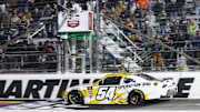 Oct 25, 2025; Martinsville, Virginia, USA; NASCAR Xfinity Series driver Taylor Gray (54) wins the NASCAR Xfinity Series Playoff Race at Martinsville Speedway.