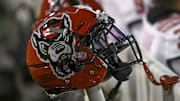 Nov 13, 2021; Winston-Salem, North Carolina, USA; A North Carolina State Wolfpack helmet seen on the sideline during the second half against the Wake Forest Demon Deacons at Truist Field. Mandatory Credit: William Howard-Imagn Images