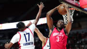 Jul 14, 2024; Las Vegas, NV, USA; Houston Rockets guard Reece Beekman (3) grabs a rebound against the Washington Wizards during the third quarter at Thomas & Mack Center.